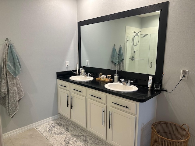 bathroom featuring vanity, tile patterned floors, and a shower with shower door