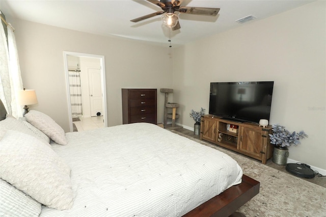 bedroom featuring ensuite bathroom and ceiling fan