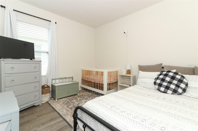 bedroom featuring wood-type flooring