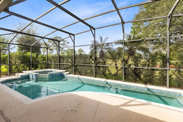 view of swimming pool with a lanai and an in ground hot tub