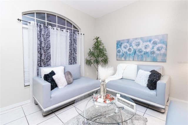 sitting room featuring tile patterned flooring