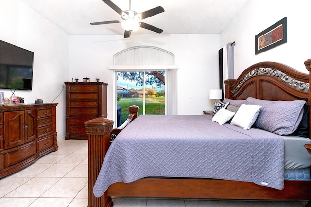 bedroom with light tile patterned floors, access to outside, and ceiling fan