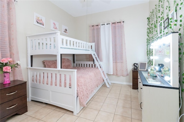 bedroom featuring light tile patterned floors