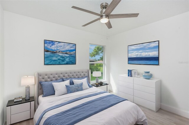 bedroom featuring ceiling fan and light wood-type flooring