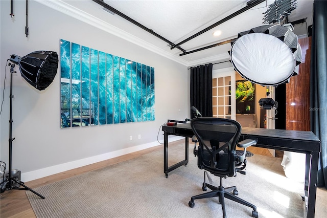 office space with hardwood / wood-style floors and ornamental molding