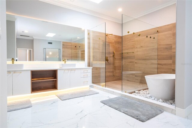 bathroom with crown molding, vanity, and shower with separate bathtub