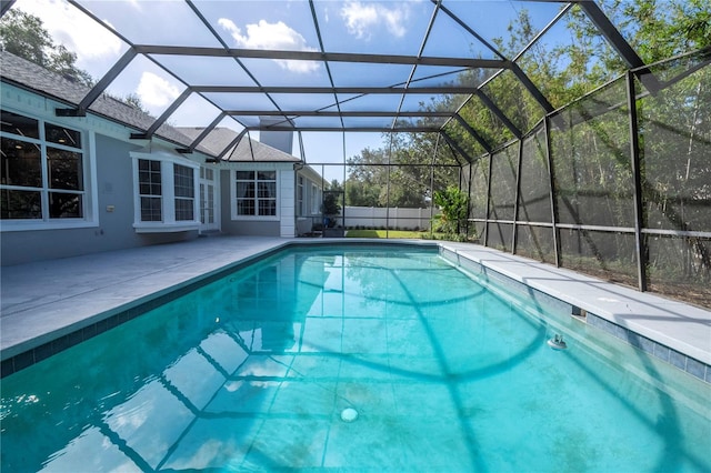 view of pool featuring a lanai and a patio