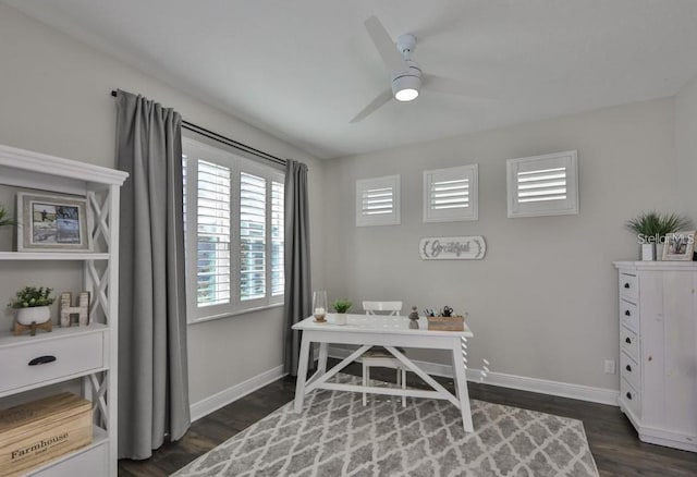 home office featuring ceiling fan and dark hardwood / wood-style flooring