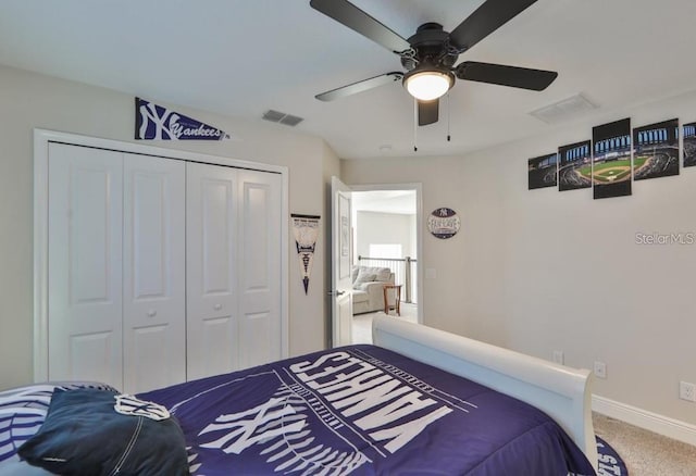 bedroom with a closet, ceiling fan, and carpet floors