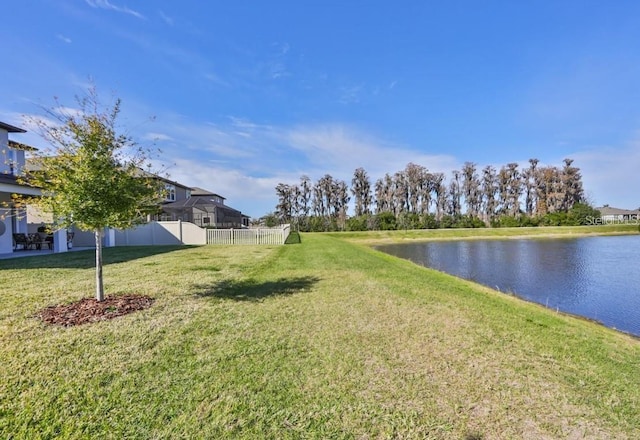 view of yard with a water view