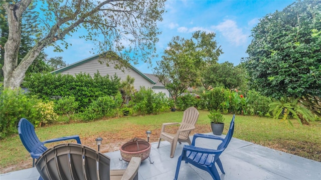 view of patio featuring an outdoor fire pit