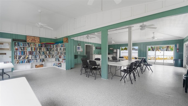 dining area with vaulted ceiling