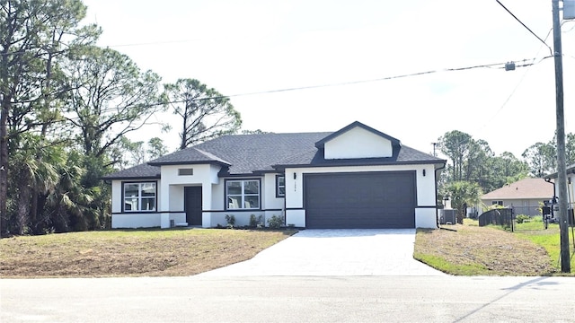 1294 Napoleon Rd, North Port, FL 34288 - view of front facade with stucco siding, driveway, cooling unit, and an attached garage