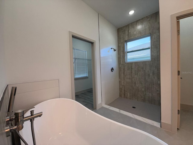 bathroom with independent shower and bath