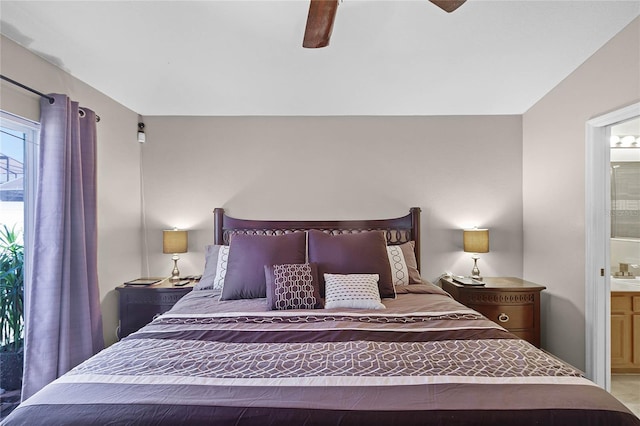 bedroom featuring ensuite bathroom and ceiling fan