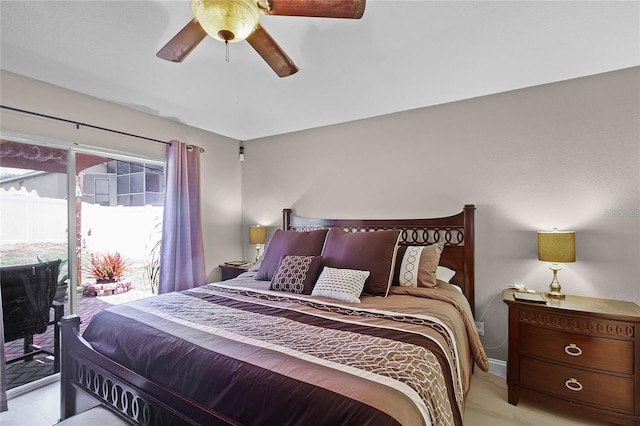 bedroom featuring ceiling fan and access to exterior