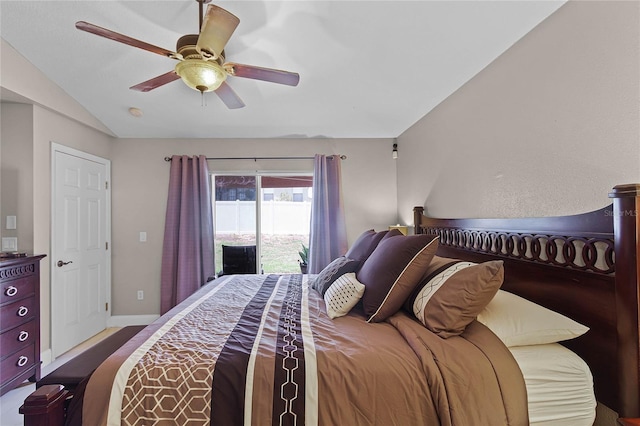 bedroom with ceiling fan, vaulted ceiling, and access to outside