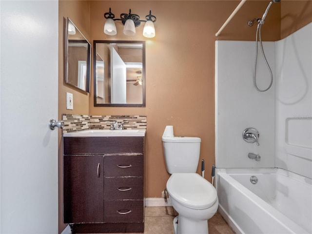 full bathroom featuring tasteful backsplash, vanity, shower / tub combination, tile patterned flooring, and toilet