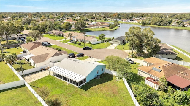 bird's eye view with a water view