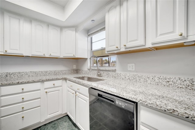 kitchen featuring white cabinets, sink, light stone counters, and dishwasher