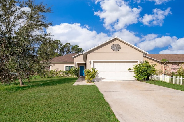 single story home featuring a garage and a front yard