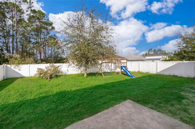 view of yard with a playground