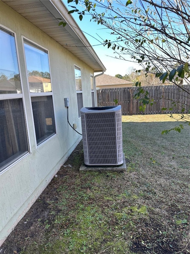 view of yard with central AC