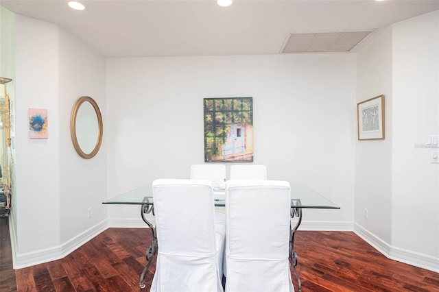 dining space with dark wood-type flooring