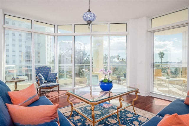 340 S Palm Ave Unit 11, Sarasota, FL 34236 - sunroom / solarium featuring expansive windows and wood finished floors