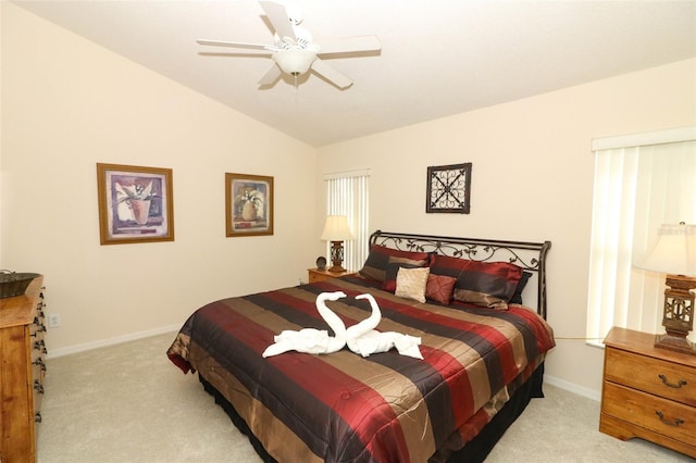 bedroom featuring lofted ceiling, light carpet, and ceiling fan