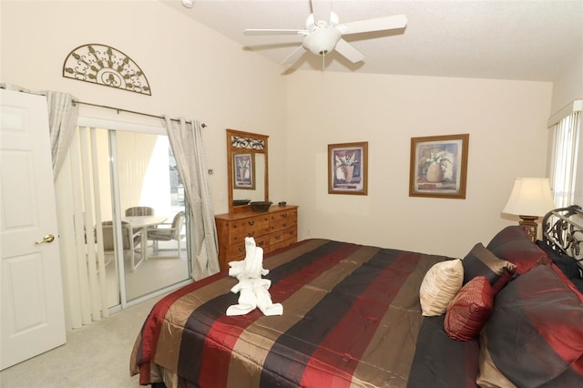 bedroom featuring lofted ceiling, light colored carpet, and ceiling fan