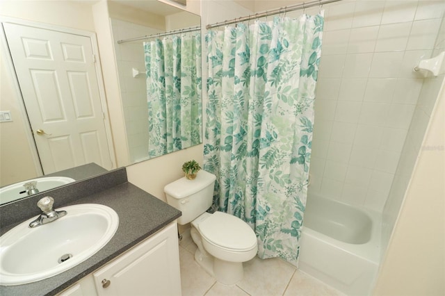 full bathroom with vanity, tile patterned floors, toilet, and shower / tub combo