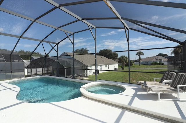 view of swimming pool featuring glass enclosure, a lawn, an in ground hot tub, and a patio area