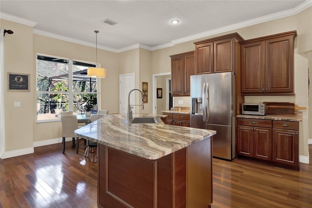 kitchen with an island with sink, stainless steel fridge with ice dispenser, dark hardwood / wood-style floors, and sink