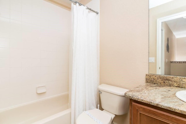 full bathroom with toilet, shower / tub combo, and vanity