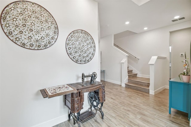 307 Shore Crab Way, Apollo Beach, FL 33572 - foyer with baseboards, light wood-style floors, recessed lighting, and stairs