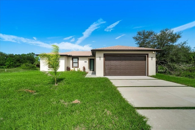 ranch-style home with a garage and a front lawn