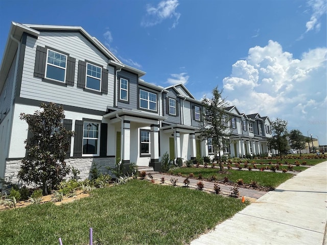 view of front facade with a front lawn