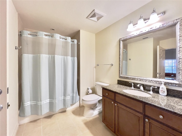 7612 Cabana Ct Unit 303, Reunion, FL 34747 - full bathroom featuring toilet, vanity, and tile patterned floors
