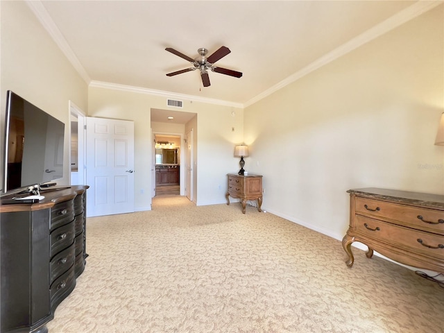 7612 Cabana Ct Unit 303, Reunion, FL 34747 - bedroom with ornamental molding, light colored carpet, baseboards, ensuite bath, and ceiling fan