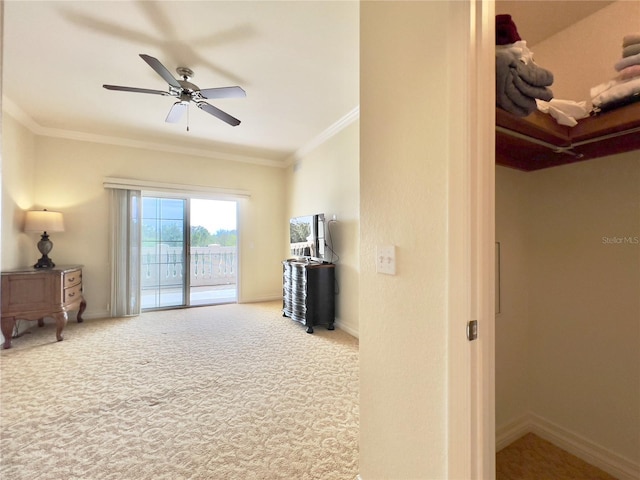 7612 Cabana Ct Unit 303, Reunion, FL 34747 - living room with crown molding, carpet, ceiling fan, and baseboards