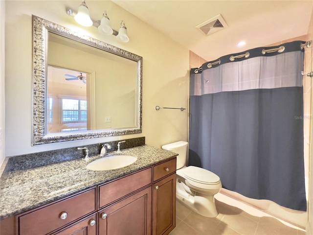 7612 Cabana Ct Unit 303, Reunion, FL 34747 - full bath with vanity, toilet, tile patterned floors, and curtained shower