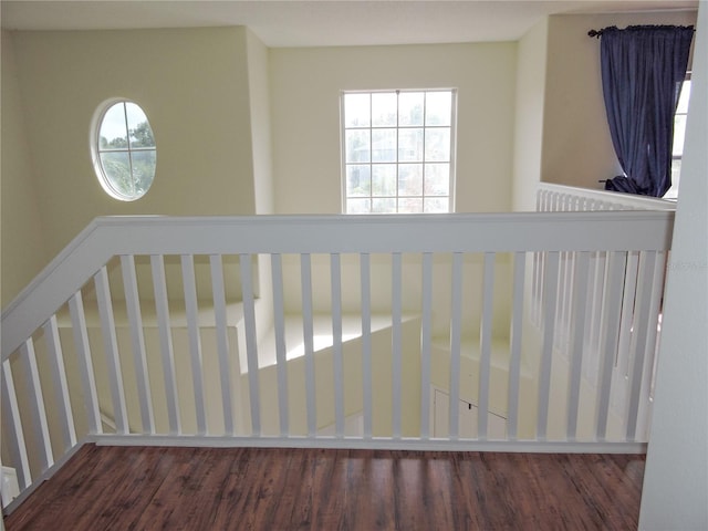 stairway featuring hardwood / wood-style floors