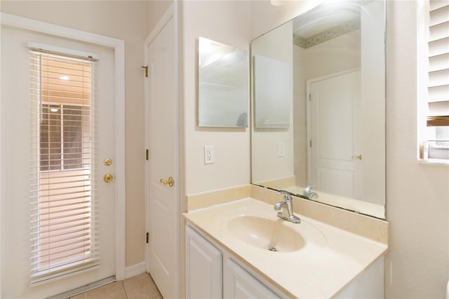 bathroom with vanity and tile patterned flooring