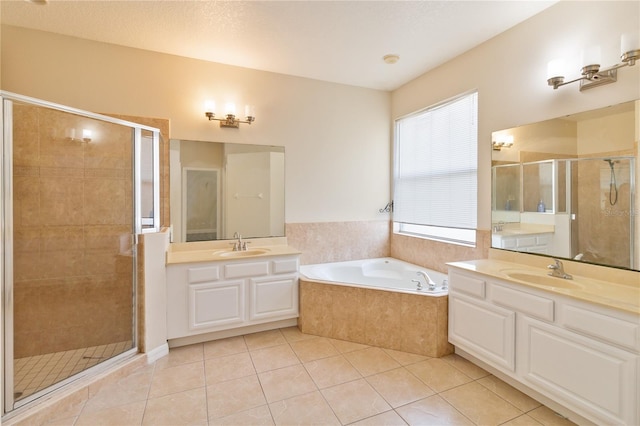 bathroom with vanity, plus walk in shower, and tile patterned floors