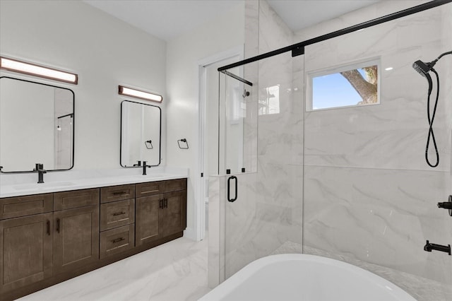 bathroom with vanity and separate shower and tub