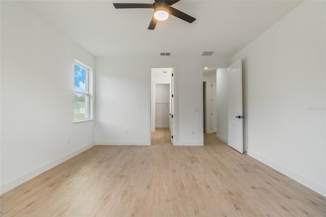 unfurnished bedroom with light hardwood / wood-style flooring and ceiling fan