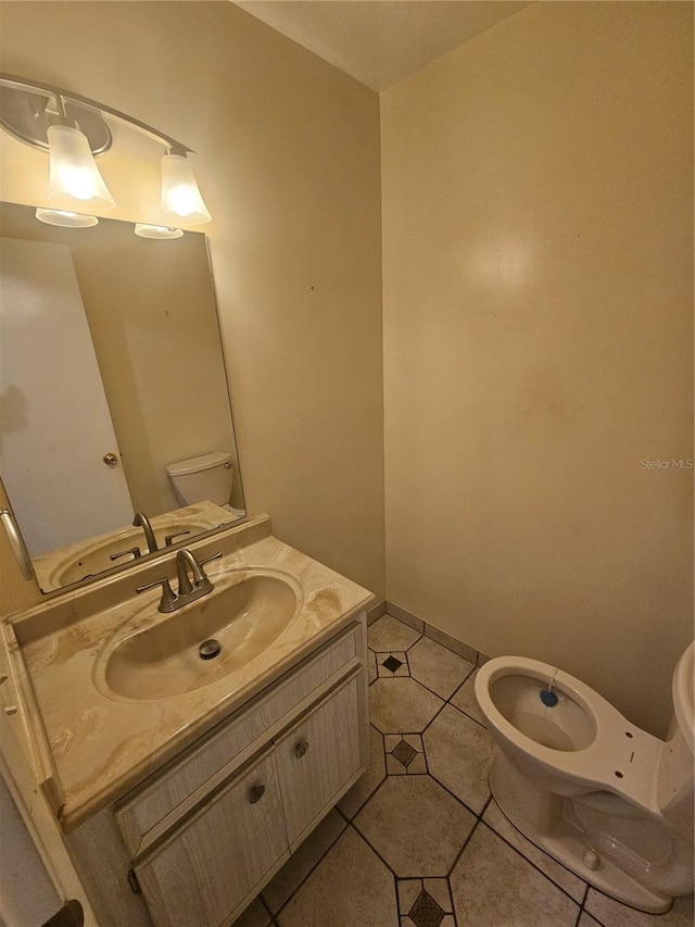 bathroom with vanity and tile patterned floors