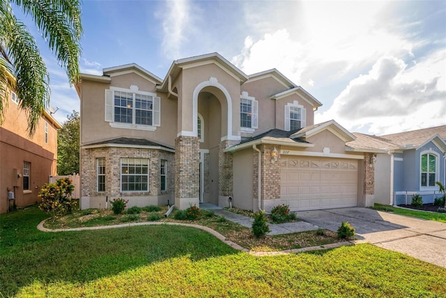 front facade with a front lawn and a garage