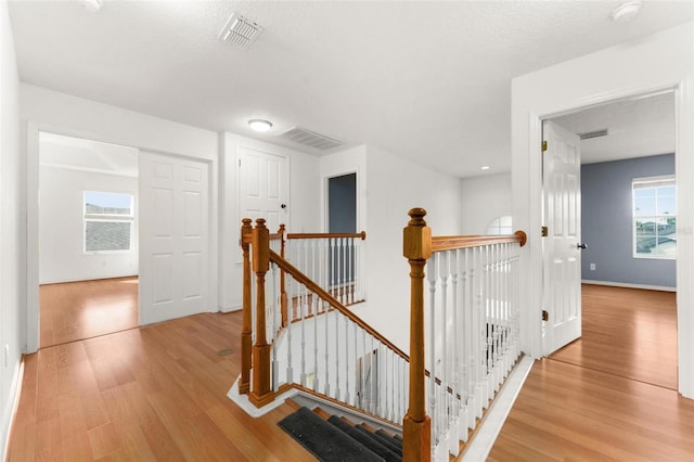 hallway featuring light wood-type flooring